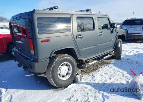 2003 Hummer H2 z USA, uszkodzony, nr VIN 5GRGN23U73H131005